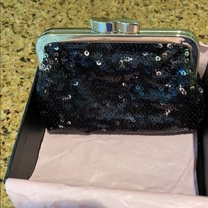 Victoria’s Secret change purse.